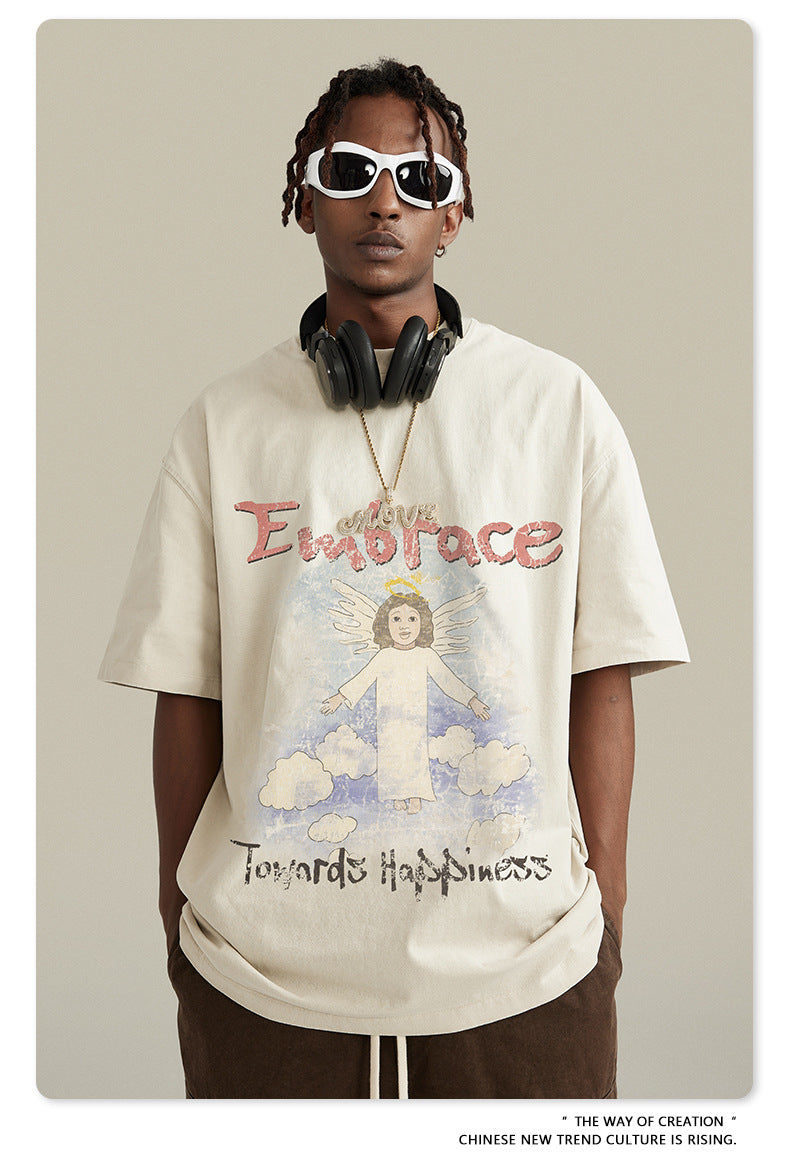 ▶𝔽𝕦𝕤𝕚𝕠𝕟 𝔽𝕠𝕔𝕦𝕤 ⌘𝓦𝓪𝓼𝓱𝓮𝓭 𝔀𝓲𝓷𝓭 ◀  2025春季新款復古街頭潮牌ins水洗天使印花圓領寬鬆大碼短袖 TZ-09